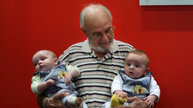 Portrait of James Harrison 72 (centre) with twin boys Seth Murray O+ (left) and Ethan Murray O-(right) in the Apheresis department at the Australian Red Cross Blood Service. Hundreds of thousands of babies owe their health and in some cases their life to James Harrison as his blood has been used in every dose of anti-D serum since 1967, which is given when the blood types of mothers and babies are incompatible. Red Cross, Sydney, NSW. Today 20th of May, 2009. Photo by KATE GERAGHTY.